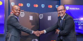 Head of Private and Personal Banking, Stanbic Bank Kenya, Abraham Ongenge (Left) and Senior Vice President and Country Manager for East Africa and Indian Ocean Islands, Mastercard, Shehryar Ali (Right) during the official launch of the Stanbic World and Stanbic World Elite Premium metallic cards in partnership with Mastercard.