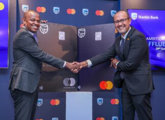 Head of Private and Personal Banking, Stanbic Bank Kenya, Abraham Ongenge (Left) and Senior Vice President and Country Manager for East Africa and Indian Ocean Islands, Mastercard, Shehryar Ali (Right) during the official launch of the Stanbic World and Stanbic World Elite Premium metallic cards in partnership with Mastercard.