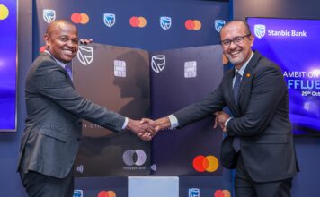 Head of Private and Personal Banking, Stanbic Bank Kenya, Abraham Ongenge (Left) and Senior Vice President and Country Manager for East Africa and Indian Ocean Islands, Mastercard, Shehryar Ali (Right) during the official launch of the Stanbic World and Stanbic World Elite Premium metallic cards in partnership with Mastercard.