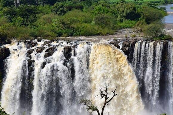 By Samson Oyugi Africa’s largest hydroelectric project The GERD, located on the Blue Nile in Ethiopia with a capacity of 5,150–6,450 MW and a reservoir holding up to 74 billion cubic meters of water is set for inauguration on 9th September 2025 after the completion of the construction works that began in 2011. The dam has been a source of pride for Ethiopia, funded domestically through bonds and public contributions, and is expected to double the country’s electricity output and even enabling energy exports to neighboring countries such as Sudan, Kenya, and Djibouti. The project sparked tensions with downstream nations of Egypt and Sudan, who fear it could reduce their Nile water supply. Egypt relies on the Nile for 97% of its water needs and has referred to the dam as an “existential threat” and labeled its operation without a binding agreement as a violation of international law. Sudan had also expressed concerns, though it has oscillated due to potential benefits like regulated water flows that could reduce on its perennial flooding . Despite years of negotiations, no legally binding agreement on the dam’s operation has been reached after meetings of negotiations up to the African Union level. Ethiopia through Prime Minister Abiy Ahmed has described the dam as a “shared opportunity” for regional cooperation and has extended an invitation to African countries including Egypt and Sudan to it's inauguration. Through his address on the ongoing preparations read to the media in Kenya by the Ethiopian Ambassador to Kenya His excellency Demeke Atnafu Ambulo he said, "Africa should be proud of such an infrastructure that is going to benefit not only Ethiopia but the greater East Africa region and even beyond economically hence solving African problems using African solutions just as Ethiopia has shown". The GERD’s completion marks a significant milestone to Ethiopia’s energy ambitions with its population projected to grow to 240 million by the year 2030 from current 130 million with half the population connected to reliable energy. With the increase in population, their energy demand will too increase.