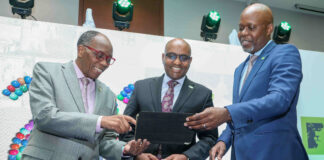 KCB Group PLC delivered strong financial results in the first half of 2025 driven by growth in earning assets, amid a difficult operating environment. The Group sustained its focus on deepening and leveraging regional scale to catalyse ongoing economic transformation and deliver value to shareholders, customers and other stakeholders. As a result, the Board of Directors has recommended an interim dividend of KShs.2.00 per share for the 2025 period and a further special dividend of KShs 2.00 per share (in relation to the sale of National Bank of Kenya). This means shareholders will get a payout of KShs.13 billion, the largest interim payment and first ever special dividend in the Bank’s history. Profit after tax grew 8% from KShs.29.9 billion to KShs.32.3 billion as all business franchises posted higher earnings, riding on customer-focused initiatives. Commentary from Group Chief Executive Officer Paul Russo “The business across markets remains resilient despite the tough operating environment in key markets like Kenya. Despite this, we have placed our customers at the fore, to ensure we meet their needs in a timely manner” said Paul Russo, the Group Chief Executive Officer during the release of the results on Wednesday. Subsidiaries outside KCB Bank Kenya continued to turn in stronger performance, with their profit before tax making up 33.4% of the overall Group earnings, and 31.4% of the balance sheet. PBT contribution from non-banking entities—KCB Investment Bank, KCB Asset Management and KCB Bancassurance Intermediary Limited was up to 2.1% from 1.8% a similar period last year. Total assets remained stable at KShs1.97 trillion, despite the sale of NBK in the second quarter of the year, demonstrating the Group’s capacity and capability to support its customers across the seven countries where KCB operates in.
