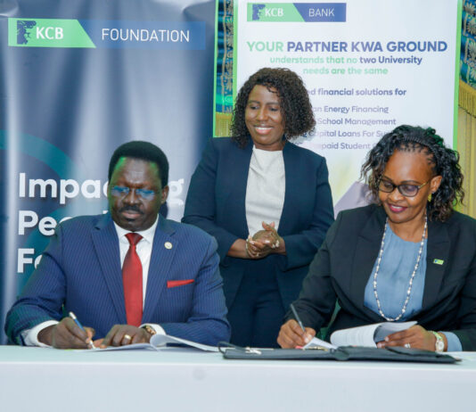 KCB Bank has signed agreements with 29 public and private universities to provide tailored financing and digital solutions aimed at supporting infrastructure development, operations, and financial access for staff, students, and suppliers. Click here to connect with us on WhatsApp The initiative will offer project finance, working capital, and digitized payment systems for institutions, alongside salary advances, mortgages, asset financing, and insurance products for teaching and non-teaching staff. Universities will also have access to green energy financing options such as solar power and biogas. Students will benefit from fee payment plans, digital banking tools, and a three-month internship programme targeting over 10,000 learners to boost practical skills and industry exposure. KCB says the programme will also extend credit and training to SMEs and suppliers linked to the universities, while surrounding communities will access enterprise development, environmental conservation projects, and scholarships through the KCB Foundation. The move comes as public universities grapple with funding shortfalls amid rising enrolment and infrastructure needs. Government data shows that most institutions face growing financial pressures, prompting calls for private sector partnerships to sustain the sector. According to Higher Education Principal Secretary Dr. Beatrice Inyangala, the collaboration aligns with government efforts to promote sustainable, inclusive, and digitally enabled higher education.
