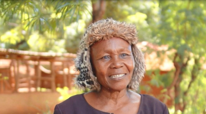 Christine Gakii is a BIMAS customer from Mukothima, Tharaka North, Tharaka Nithi County. Her journey with BIMAS Microfinance began in 2014, after her life had taken a dramatic turn. Family disputes had stripped her of everything, leaving her in a state of despair. Just when all seemed lost, a trusted friend guided her towards BIMAS Microfinance. Her journey with BIMAS began with a modest loan of Ksh 30,000, which she invested in her dream of starting a cereal farm. Through hard work and perseverance, she repaid her loans faithfully and steadily climbed the loan tiers. Her farm flourished, expanding across multiple plots of land. With courage, she ventured into a new frontier: a pork butchery with a small kitchenette. Her determination paid off, and the business thrived. Seeing her dedication, BIMAS went further, helping her acquire a motorbike to transport her products more efficiently. As her pork business grew, the daily slaughtering of pigs demanded more water. Recognizing her relentless commitment, BIMAS provided funding for a water tank and an energy saving Jiko for her kitchenette. Christine's journey is truly inspiring. Despite facing many challenges, she has risen above them all. Now, she owns a thriving pork butchery, employs many people, and has become a successful landowner and farmer. She even owns three motorbikes. Christine dreams of building rental houses on one of her best pieces of land, which is close to an institute. With BIMAS ready to help, her dream is on its way to becoming a reality. She proudly refers to BIMAS Microfinance as her "father and mother," underscoring the profound impact it has had on her life. In a heartfelt message, she encourages those facing hardships not to turn to stress-induced drinking, but to seek support from BIMAS. She says, "At BIMAS, help is available for everyone." Christine's journey with BIMAS Microfinance exemplifies women empowerment and promotes multiple Sustainable Development Goals. Through initial funding and continuous support, BIMAS enabled her to break the cycle of poverty and establish a thriving business in cereal farming and pork butchery, enhancing food security in her community. By nurturing her entrepreneurship, BIMAS promotes gender equality and economic empowerment. Moreover, Christine's enterprise generates employment opportunities and sustains livelihoods. The provision of a water tank further ensures operational efficiency and supports her overall well-being. 
