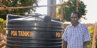 Dennis Ngari, a resident of Rianjeru village in Embu County, faced significant challenges due to water scarcity in the semi-arid region. The community depended on a World Bank-funded water project, which often ran dry during the harsh dry seasons. As the sole breadwinner, Dennis struggled to provide enough water for his farm and his family's needs, forcing him to make long trips on his boda-boda to fetch water from distant sources. His farm, located near a river, had to compete with other farmers for the limited water supply, leaving his family in a constant struggle. In February 2021, Dennis found a lifeline through BIMAS microfinance. He received a loan of Ksh 42,000 to buy and install a 6,000-liter water tank at his home. This loan transformed his life. With a reliable water supply, Dennis's farm flourished, and his boda-boda business stabilized. The constant access to water allowed him to tend to his crops year-round, even during the dry seasons. Now, Dennis and his family are planning to expand their business, aiming for another loan to purchase a 10,000-liter tank to ensure an ample water supply for their growing farm. Grateful for the support, Dennis says, "BIMAS came to my rescue when I was about to give up on farming. Now, I can farm in all seasons without worrying if the rivers run dry. My farming business has flourished since joining hands with BIMAS. We can nurture our farm day or night, rain or shine." Dennis's story is a shining example of the positive impact BIMAS has had on his life and his family's future.