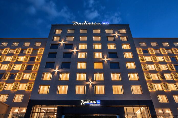 adisson Blu has once again secured top honors at the World Travel Awards Africa, taking the title of “Africa’s Leading Hotel Brand” for 2025. This win marks the fourth consecutive year the upperupscale brand has claimed the region’s most prestigious hospitality award, reinforcing its position as an industry leader across the continent. At the same ceremony, Radisson Hotel Group (www.RadissonHotels.com) properties picked up 14 more trophies, led by Africa’s Leading Conference Hotel for Radisson Blu Hotel & Convention Centre, Kigali and swept country awards in Côte d’Ivoire, Gabon, Kenya, Mali, Niger, Rwanda, and Senegal. A heritage of design, service, and growth The Group’s journey began in 1960 with the opening of the world’s first designer hotel in Copenhagen, Denmark. That hotel, now the Radisson Collection Royal Hotel, Copenhagen, is still operating successfully. Since then, Radisson Hotel Group has expanded to ten distinctive brands, with Radisson Blu at its core. In Africa, the Group entered in 2000 with the opening of Radisson Blu Hotel, Waterfront in Cape Town. which has now transitioned to Radisson Collection Hotel, Waterfront Cape Town. Accelerating across Africa Over the past fifteen months, the Group has signed eleven hotels and opened seven, bringing its African portfolio to 100 hotels in more than 30 countries and cementing its status as the continent’s most active international operator. Radisson Blu continues to drive much of that momentum, from Casablanca to Cape Town. Recent highlights include the opening of the Radisson Blu Hotel, Conakry, just three months after signing, as well as new signings, including the Radisson Blu Hotel & Apartments, Yaoundé. Scheduled to open by the end of 2026, the Radisson Blu Hotel, Kinshasa is opening late 2026 “Our teams live and breathe purposeful hospitality, and this award shows how consistently they deliver,” says Tim Cordon, Chief Operating Officer for the Middle East, Africa, and Southeast Asia Pacific at Radisson Hotel Group. “Winning four years in a row isn’t luck. It reflects a clear strategy, strong local partnerships, and a brand culture that turns every stay into a memorable moment. We’re already the most diverse hotel company on the continent, operating in more than 30 African countries, and we’re just getting started. Africa sits at the heart of our growth plans, and guests can expect even more thoughtfully designed Radisson Blu hotels to open their doors soon.” Looking ahead Across its ten brands, Radisson Hotel Group, is on track to reaching 150 hotels by 2030 in Africa and will continue to pair global standards with genuine local insight.