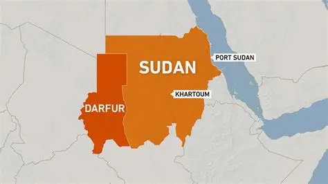 Adam Ibrahim was working with the UN humanitarian agency, OCHA, in his home country, Sudan, when conflict between rival armed forces erupted in early 2023 and he became a refugee alongside thousands of others who continue to flee the ongoing violence. Sudan is one of the world’s largest and most complex humanitarian crises, with more than 30.4 million people – over half the population – urgently needing humanitarian assistance, yet the 2025 Sudan humanitarian needs and response plan is severely underfunded, with only 13.3 per cent of the required resources received so far. Forced to flee the country with his family after the war intensified, Mr. Ibrahim returned to help people affected by the war in Darfur. Ahead of World Humanitarian Day, marked annually on 19 August, he described his journey, from aid worker to refugee and back again to Sudan. “I was at home helping my daughter revise for her grade six exams, scheduled for the next day. Then, out of nowhere, the sound of heavy gunfire shattered the silence in my hometown, Zalingei, the capital of Central Darfur state, which remains gripped by insecurity and critical shortages of basic services. At first, I thought the gunfire would pass quickly. I rushed to stock up on food supplies and water, enough for six days. But, the streets became battlegrounds. All I could do was try to keep my family safe. Despite the chaos, I continued to work. Electricity and Internet access were sporadic, but I kept my phone charged to send daily updates to the OCHA Head of Office. It gave me purpose amid the uncertainty. Eventually, it became too dangerous to stay. The journey of displacement On the 39th day, we fled. Our family of 10 began a harrowing journey with no clear destination, only the desperate need to escape. We left behind more than just walls and belongings; we left behind a life built with love and hope. Our journey took us first to Nyala in South Darfur, then to Kosti in White Nile State. From there, we crossed the border into neighbouring South Sudan and eventually reached Uganda, a country I had heard offered stability and a good education system for children. The journey by car took 23 days. My children had no passports, and there were no refugee camps for Sudanese nationals at the time. To my relief, migration authorities in both countries were kind and supportive. In Kampala, we rented a house and received asylum status within three days. The moment I held our refugee cards, I exhaled deeply and thought ‘we’ve made it.’ I enrolled my children in school and began working online, finally finding a sense of stability. Here I was, an aid worker now a refugee, needing the same support I once provided to others. Returning to Zalingei Months later, I faced a difficult decision. Do I stay with my family or return to Darfur and continue the work I had done for years? I chose to return. Leaving my family behind was incredibly hard, but their safety was paramount. I returned to Zalingei with a renewed sense of duty to serve those still trapped in the hardship I had endured. I was also the sole breadwinner for my family and needed to ensure they could survive in Uganda. My hometown changed When I arrived in Zalingei, I barely recognised it. Buildings were scarred with bullet holes. I found another family sheltering inside our house, a doctor and his family whose own home had been destroyed. I let them stay, setting aside a small section for myself and a colleague. The house had been looted. Windows were gone and our belongings had vanished. I had hoped to find my children’s school certificates, photos, any documents left behind. But, they were gone. Everyone was armed, even children as young as 15. People were tense, traumatised and always bracing for the next wave of violence. Machine guns and wreckage in West Darfur I didn’t stay long in Zalingei. Soon I was called to El Geneina in West Darfur, a town devastated by violence, and whose people desperately needed humanitarian support. El Geneina’s streets were strewn with the wreckage of burned-out military vehicles. Armed men patrolled in pickup trucks mounted with machine guns. The humanitarian needs were immense. People lacked food, shelter, household essentials, healthcare, clean water and protection, but we never had enough resources for them. Family, sacrifice and hope for Sudan It’s heartbreaking to witness the suffering caused by the recent donor funding cuts. Many organizations have been forced to scale back their operations, leaving countless people without help. Still, we did all we could. Between 2023 and 2025, we reached more than 800,000 displaced people with critical assistance, in West and Central Darfur. I also went on to work with OCHA colleagues in Chad to coordinate cross-border humanitarian convoys into Darfur. These convoys were lifelines, delivering food, medicine and supplies to communities cut off by conflict. Today, I remain in Sudan. My family is still in Uganda. I visit them once a year, but the separation is painful.”