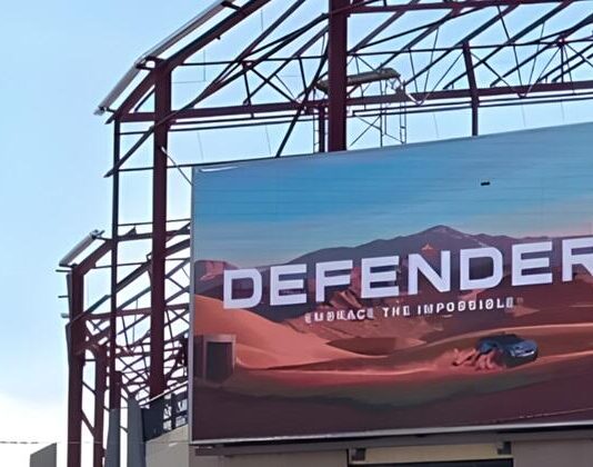 Polygon (https://PDOOH.co.za/), Africa’s leading and largest programmatic aggregated digital out-of-home (DOOH) publisher network has launched its first programmatic DOOH (pDOOH) campaign in Kenya for luxury automotive brand Jaguar Land Rover (JLR). The campaign, executed in partnership with Polygon’s technology provider Place Exchange and media agency Omnicom Media Group (OMG), celebrates JLR’s 55-year anniversary and showcases the latest Defender model. However, it also represents another important milestone for the Kenyan advertising landscape, as the first locally-activated pDOOH campaign to run through Google-based trading tools. “This is a watershed moment for both the Kenyan and broader African DOOH markets, says Remi du Preez, Managing Director at Polygon. “It demonstrates how international brands can now transact programmatically across our network using the same digital platforms they rely on globally, bringing true omnichannel capability to Africa.” The JLR campaign currently focuses on Nairobi, targeting affluent suburbs, upmarket malls and Jomo Kenyatta International Airport. Initially launched across a limited number of sites, the rollout will soon expand to around 50 premium screens. While Kenya’s OOH market is smaller than South Africa’s, it remains one of Africa’s top five regions for outdoor media, with a fast-growing digital footprint and increasing advertiser appetite, says Du Preez. “The local market’s sentiment toward DOOH has shifted dramatically over the past few years. As advertisers see its value and measurability, media owners are incentivised to build and convert more digital inventory which, in turn, enables programmatic trading to thrive.” For JLR, the campaign forms part of a broader omnichannel strategy, where optimisation and attribution play key roles. Through Polygon’s programmatic model which enables day-part targeting, the client can reduce wastage by serving in specific pockets of time and maximising their budget. “The ability to dynamically serve ads, monitor engagement and adjust in real-time delivers to avoid wastage brings a level of agility that traditional loop-based buying can’t match,” says Du Preez. Polygon leverages Place Exchange (PX) as its core inventory exchange for all programmatic transactions across Africa. PX’s integration with Google’s ecosystem bridges the gap between global buyers and local media owners, allowing advertisers to simply activate, pause or manage campaigns across multiple African markets. “Through Place Exchange, we’ve created an infrastructure where brands like Jaguar Land Rover can extend their global programmatic strategy into Africa, with the same efficiency, measurability and transparency they expect elsewhere,” explains Du Preez. With nine African countries already connected to its network – and more being added –Polygon’s vision is to entrench its position as Africa’s largest DOOH network, offering advertisers a single entry point into a fragmented market while unlocking new revenue streams for local media owners. “This campaign is a testament to how far we’ve come. We’re proud to be driving innovation that not only connects global brands to African audiences, but also strengthens local ecosystems while speeding up digital transformation across the continent,” Du Preez says.