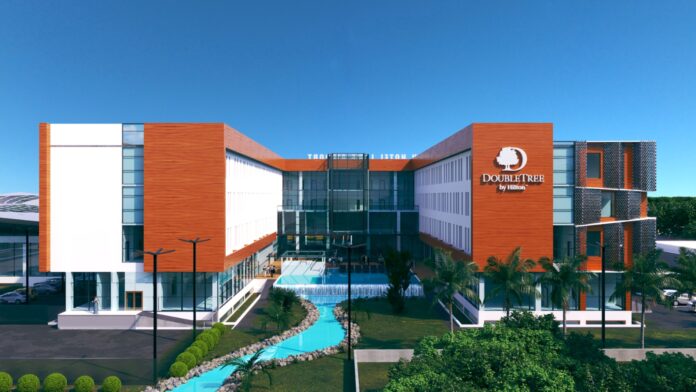 Hilton (NYSE: HLT) today announced the Africa expansion of DoubleTree by Hilton, its upscale brand known for its warm hospitality, with the signing of three new properties in key destinations across North, West and Central Africa: Morocco, Togo and the Republic of Congo. These latest signings include Hilton’s debut in Togo and underscore Hilton’s commitment to growing its footprint on the continent, where the global hospitality company now has more than 100 hotels in its pipeline. Carlos Khneisser, chief development officer, Middle East & Africa, Hilton, said: “Africa’s major business hubs, rich cultural heritage, and spectacular landscapes continue to present exciting opportunities for growth. We are delighted to expand our footprint with three new DoubleTree by Hilton properties, which will join Hilton’s growing portfolio in Africa as we plan to nearly triple our presence across the continent in the coming years. These signings reflect our commitment to supporting Africa’s hospitality sector – with dedicated local development teams on the ground and deep expertise in these markets, we are well positioned to create long-term value for our partners and deliver world-class stays to our guests.” DoubleTree by Hilton Lomé Airport, Togo Marking Hilton’s debut in Togo, DoubleTree by Hilton Lomé Airport is developed in partnership with SODEXH SA. Strategically located opposite Lomé International Airport, the hotel will be the country's first internationally branded airport property, offering upscale services and conference facilities to business travellers. The hotel will feature 165 guest rooms and suites, a signature restaurant, a lobby café, as well as an outdoor pool, spa and fitness centre. Flexible meeting spaces include a ballroom and three meeting rooms, designed to cater to business travellers and transit guests with easy access to the city’s commercial and cultural hubs. DoubleTree by Hilton Kintele, Republic of Congo Located in Brazzaville’s emerging Kintele district, this property will include 200 guest rooms and suites, a fitness centre, tennis court, spa, and beauty salon. Guests will enjoy multiple dining venues including a lobby bar and terrace, pool bar, and two specialty restaurants with panoramic views of the Congo River. The hotel will house West Africa’s largest conference centre, which spans 75,000 sqm with an auditorium for 1,500 guests, banquet halls, a VIP lounge, and museum hall – making the hotel a prime accommodation choice for major events and corporate gatherings. Signed with Société d’Exploitation et de Développement des Infrastructures du Congo (SEDIC), DoubleTree by Hilton Kintele will start welcoming guests in 2026, joining the recently opened Hilton Brazzaville Les Tours Jumelles Hotel & Residences. DoubleTree by Hilton Marrakech La Palmeraie, Morocco Set in Marrakech’s renowned Palmeraie district, this resort-style property will offer 228 guest rooms and suites, landscaped gardens, and multiple dining options including an all-day dining restaurant, lobby café, pool bar, and two specialty restaurants. Guests will enjoy a relaxing pool area and kids pool, gym, spa, and paddle court. The hotel will also feature a ballroom and meeting rooms, with close proximity to the city’s historic district and vibrant souks. The hotel is expected to open in 2028. This latest signing joins Hilton’s rapidly growing footprint in Morocco with 16 hotels in the pipeline, including the highly anticipated Waldorf Astoria Rabat Salé and Hampton by Hilton Ben Guerir – both opening soon. The properties will join DoubleTree by Hilton´s global portfolio of more than 700 hotels across 61 countries and territories, where the award-winning brand is renowned for delivering warm and contemporary hospitality to business and leisure travellers – complete with its signature DoubleTree chocolate chip cookie welcome. DoubleTree by Hilton’s momentum continues across Africa with several signings announced earlier this year, including DoubleTree by Hilton Cabinda Futila Residences in Angola, DoubleTree by Hilton Adama and DoubleTree by Hilton Dire Dawa in Ethiopia, and DoubleTree by Hilton Fes Golf in Morocco.