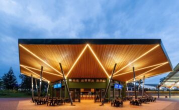 Zaria Court Kigali is now officially open as part of Tapestry Collection by Hilton, marking a transformative milestone for Rwanda's first urban lifestyle hotel and reinforcing the nation's expanding presence in the global hospitality landscape. This new chapter brings together Zaria Court Kigali’s distinctive identity, rooted in authentic African excellence and vibrant local culture, with Hilton's world-class standards, global reach, and the Hilton Honors loyalty program. Tapestry Collection by Hilton is a global portfolio of independent hotels, each with an original, vibrant personality. Every hotel's unique story comes to life through elevated design and food and beverage inspired by the locale, offering guests authentic experiences across an array of destinations worth exploring. Located in the heart of Kigali Sports City, steps from the 10,000-seat BK Arena and the iconic 45,000-seat Amahoro Stadium, Zaria Court Kigali has redefined hospitality in one of East Africa's most dynamic capitals. Now part of Tapestry Collection by Hilton, the 80-room property enters an exciting new era, offering guests an elevated experience that blends the spirit of modern Africa with the consistency and service excellence of a globally recognized brand. A New Chapter for Zaria Court Kigali Guests at Zaria Court Kigali can enjoy the hotel’s bold contemporary design, Rwandan craftsmanship, and the comfort of Hilton’s trusted brand experience including Digital Key and direct booking perks. "This is a defining moment for Zaria Court Kigali," says Masai Ujiri, the Founder of Zaria Group whose vision of African excellence inspired the hotel's creation. "Just as the hotel's story began in Zaria, Nigeria, on basketball courts where dreams took flight, today marks another chapter in that journey. We're proving that African hospitality can lead on the world stage, maintaining our authentic identity while embracing global standards that allow us to serve our guests even better." Zaria Court Kigali, Tapestry Collection by Hilton is poised to welcome a broad international audience, from business travelers and sports teams to cultural innovators and leisure guests, while preserving the warm, community-driven atmosphere that defines the property. Guests can now earn and redeem Hilton Honors points while enjoying the hotel's signature lifestyle offerings - from the rooftop lounge with beautiful views of Kigali Sports City to the Sports Bar featuring 19 large screens and bold African-inspired cuisine. Elevating the Guest Experience As a Tapestry Collection by Hilton hotel, Zaria Court Kigali integrates Hilton’s service culture and operational excellence across every touchpoint – from personalized prearrival communications to thoughtful in room amenities designed for comfort and convenience. The hotel features unique spaces including a heated pool overlooking the multipurpose court, a sophisticated lobby bar, a globally inspired all-day dining restaurant, and a rooftop lounge – perfect for elevated evenings. Guy Hutchinson, President, Middle East & Africa, Hilton, said, "We are excited to open our first hotel in Rwanda, Zaria Court Kigali, Tapestry Collection by Hilton, which will join Hilton’s growing portfolio in Africa as we plan to nearly triple our presence across the continent in the coming years. Tapestry Collection by Hilton celebrates independent hotels with distinct personalities and strong local connections, and Zaria Court Kigali embodies this perfectly; it's deeply rooted in Rwandan culture and the energy of Kigali Sports City, while offering the kind of contemporary, lifestyle-focused experience that today's travelers seek." A Destination, Not Just Accommodation Zaria Court Kigali's location within a mixed-use sports and entertainment development reinforces its role as a cultural and social hub. The property seamlessly integrates with retail spaces, event facilities, and recreational amenities including a community basketball court and five-a-side football pitch. Guests don't simply stay at Zaria Court Kigali; they step into the vibrant rhythm of Kigali's most dynamic district. The hotel's meeting and event spaces offer modern projection systems and theatre-style seating for up to 60 guests, with adjacent areas that can accommodate cocktail receptions for 120 people. Whether hosting corporate seminars, intimate gatherings, or celebrating after a concert or game, the spaces embody the property's philosophy: creating spaces where meaningful connections flourish. Every element of the property celebrates African innovation and community, be it the locally-crafted artwork adorning the walls or eco-friendly design principles that earned EDGE certification. The hotel features vibrant, locally-inspired interiors showcasing Rwandan craftsmanship and contemporary African art, creating an authentic cultural experience that celebrates the continent's creative spirit while meeting international standards of comfort and quality. Zaria Court Kigali, Tapestry Collection by Hilton, offers guests seeking authentic experiences and genuine connections, a memorable, locally-inspired stay. The hotel’s diverse venues create destinations within the destination: the Sports Bar offers an unmatched viewing experience with international football, rugby, F1, and basketball; MANSELA’s All-Day Dining restaurant serves energizing international breakfast buffets alongside vibrant fusion cuisine for lunch and dinner; ANUVO lobby bar provides an intimate spot for coffee breaks and casual meetings; SOLIA pool bar blends relaxation with entertainment, overlooking the multipurpose court where guests might catch a live game while swimming; and The JARO rooftop lounge delivers sophisticated ambiance with crafted cocktails and breathtaking panoramic views. Future plans include rotating art installations featuring local artisans, curated cultural programming, and expanded partnerships with Rwandan entrepreneurs through the hotel's retail concepts. The vision remains consistent: creating spaces that inspire the next generation of African leaders while offering world-class hospitality. Significance for Rwanda's Hospitality Landscape The partnership reflects growing international confidence in Rwanda as a premier destination for business, leisure, sports, and lifestyle travel. As one of Africa's safest countries as per the Global Peace Index 2024 and the first on the continent in Business Readiness according to World Bank’s B-READY 2025 Report, Rwanda has positioned itself at the forefront of the continent's transformation. Zaria Court Kigali’s integration into Hilton's globally respected portfolio strengthens Kigali's hospitality offering and supports the nation's broader tourism and investment narrative by reinforcing international traveler confidence. With 70% of Rwanda's population under 30 and the country experiencing unprecedented investment in sports and entertainment infrastructure, including over $260 million in public and private funding transforming Kigali Sports City, the timing couldn't be more significant. The hotel sits at the epicenter of Africa's emerging sports tourism boom, hosting international teams, artists, executives, and fans attending major events at adjacent world-class venues. Closing 2025 with Momentum Zaria Court Kigali now offers guests access to Hilton Honors – Hilton’s award-winning loyalty program with over 235 million members and a portfolio of 9,000+ hotels across 25 world-class brands – delivering a richer, more rewarding travel experience. For travelers seeking experiences that celebrate Africa's energy, creativity, and forward momentum, Zaria Court Kigali offers a gateway to contemporary Kigali. For Hilton Honors members exploring new destinations, the property presents an opportunity to discover Rwanda's remarkable hospitality through a distinctive, lifestyle-focused lens. And for Rwanda, this partnership reinforces the nation's position as a leader in African tourism and hospitality innovation. - ENDS - About Zaria Court Kigali, Tapestry Collection by Hilton Zaria Court Kigali is Kigali's first urban lifestyle hotel, located in the heart of Rwanda's Sports City and premier sports and entertainment district. The 80-room property features vibrant, locally-inspired interiors, multiple food and beverage outlets, meeting and event spaces, and a heated pool. Inspired by the vision of Masai Ujiri and rooted in authentic African excellence, the hotel celebrates the continent's creative spirit while delivering world-class hospitality. Now part of Tapestry Collection by Hilton, Zaria Court Kigali offers guests access to Hilton Honors benefits while maintaining its distinctive character and community-driven approach.