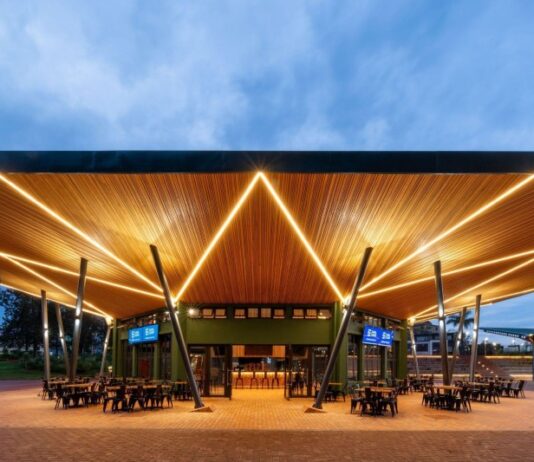 Zaria Court Kigali Now Open as Part of Tapestry Collection by Hilton Zaria Court Kigali is now officially open as part of Tapestry Collection by Hilton, marking a transformative milestone for Rwanda's first urban lifestyle hotel and reinforcing the nation's expanding presence in the global hospitality landscape. This new chapter brings together Zaria Court Kigali’s distinctive identity, rooted in authentic African excellence and vibrant local culture, with Hilton's world-class standards, global reach, and the Hilton Honors loyalty program. Tapestry Collection by Hilton is a global portfolio of independent hotels, each with an original, vibrant personality. Every hotel's unique story comes to life through elevated design and food and beverage inspired by the locale, offering guests authentic experiences across an array of destinations worth exploring. Located in the heart of Kigali Sports City, steps from the 10,000-seat BK Arena and the iconic 45,000-seat Amahoro Stadium, Zaria Court Kigali has redefined hospitality in one of East Africa's most dynamic capitals. Now part of Tapestry Collection by Hilton, the 80-room property enters an exciting new era, offering guests an elevated experience that blends the spirit of modern Africa with the consistency and service excellence of a globally recognized brand. A New Chapter for Zaria Court Kigali Guests at Zaria Court Kigali can enjoy the hotel’s bold contemporary design, Rwandan craftsmanship, and the comfort of Hilton’s trusted brand experience including Digital Key and direct booking perks. "This is a defining moment for Zaria Court Kigali," says Masai Ujiri, the Founder of Zaria Group whose vision of African excellence inspired the hotel's creation. "Just as the hotel's story began in Zaria, Nigeria, on basketball courts where dreams took flight, today marks another chapter in that journey. We're proving that African hospitality can lead on the world stage, maintaining our authentic identity while embracing global standards that allow us to serve our guests even better." Zaria Court Kigali, Tapestry Collection by Hilton is poised to welcome a broad international audience, from business travelers and sports teams to cultural innovators and leisure guests, while preserving the warm, community-driven atmosphere that defines the property. Guests can now earn and redeem Hilton Honors points while enjoying the hotel's signature lifestyle offerings - from the rooftop lounge with beautiful views of Kigali Sports City to the Sports Bar featuring 19 large screens and bold African-inspired cuisine. Elevating the Guest Experience As a Tapestry Collection by Hilton hotel, Zaria Court Kigali integrates Hilton’s service culture and operational excellence across every touchpoint – from personalized prearrival communications to thoughtful in room amenities designed for comfort and convenience. The hotel features unique spaces including a heated pool overlooking the multipurpose court, a sophisticated lobby bar, a globally inspired all-day dining restaurant, and a rooftop lounge – perfect for elevated evenings. Guy Hutchinson, President, Middle East & Africa, Hilton, said, "We are excited to open our first hotel in Rwanda, Zaria Court Kigali, Tapestry Collection by Hilton, which will join Hilton’s growing portfolio in Africa as we plan to nearly triple our presence across the continent in the coming years. Tapestry Collection by Hilton celebrates independent hotels with distinct personalities and strong local connections, and Zaria Court Kigali embodies this perfectly; it's deeply rooted in Rwandan culture and the energy of Kigali Sports City, while offering the kind of contemporary, lifestyle-focused experience that today's travelers seek." A Destination, Not Just Accommodation Zaria Court Kigali's location within a mixed-use sports and entertainment development reinforces its role as a cultural and social hub. The property seamlessly integrates with retail spaces, event facilities, and recreational amenities including a community basketball court and five-a-side football pitch. Guests don't simply stay at Zaria Court Kigali; they step into the vibrant rhythm of Kigali's most dynamic district. The hotel's meeting and event spaces offer modern projection systems and theatre-style seating for up to 60 guests, with adjacent areas that can accommodate cocktail receptions for 120 people. Whether hosting corporate seminars, intimate gatherings, or celebrating after a concert or game, the spaces embody the property's philosophy: creating spaces where meaningful connections flourish. Every element of the property celebrates African innovation and community, be it the locally-crafted artwork adorning the walls or eco-friendly design principles that earned EDGE certification. The hotel features vibrant, locally-inspired interiors showcasing Rwandan craftsmanship and contemporary African art, creating an authentic cultural experience that celebrates the continent's creative spirit while meeting international standards of comfort and quality. Zaria Court Kigali, Tapestry Collection by Hilton, offers guests seeking authentic experiences and genuine connections, a memorable, locally-inspired stay. The hotel’s diverse venues create destinations within the destination: the Sports Bar offers an unmatched viewing experience with international football, rugby, F1, and basketball; MANSELA’s All-Day Dining restaurant serves energizing international breakfast buffets alongside vibrant fusion cuisine for lunch and dinner; ANUVO lobby bar provides an intimate spot for coffee breaks and casual meetings; SOLIA pool bar blends relaxation with entertainment, overlooking the multipurpose court where guests might catch a live game while swimming; and The JARO rooftop lounge delivers sophisticated ambiance with crafted cocktails and breathtaking panoramic views. Future plans include rotating art installations featuring local artisans, curated cultural programming, and expanded partnerships with Rwandan entrepreneurs through the hotel's retail concepts. The vision remains consistent: creating spaces that inspire the next generation of African leaders while offering world-class hospitality. Significance for Rwanda's Hospitality Landscape The partnership reflects growing international confidence in Rwanda as a premier destination for business, leisure, sports, and lifestyle travel. As one of Africa's safest countries as per the Global Peace Index 2024 and the first on the continent in Business Readiness according to World Bank’s B-READY 2025 Report, Rwanda has positioned itself at the forefront of the continent's transformation. Zaria Court Kigali’s integration into Hilton's globally respected portfolio strengthens Kigali's hospitality offering and supports the nation's broader tourism and investment narrative by reinforcing international traveler confidence. With 70% of Rwanda's population under 30 and the country experiencing unprecedented investment in sports and entertainment infrastructure, including over $260 million in public and private funding transforming Kigali Sports City, the timing couldn't be more significant. The hotel sits at the epicenter of Africa's emerging sports tourism boom, hosting international teams, artists, executives, and fans attending major events at adjacent world-class venues. Closing 2025 with Momentum Zaria Court Kigali now offers guests access to Hilton Honors – Hilton’s award-winning loyalty program with over 235 million members and a portfolio of 9,000+ hotels across 25 world-class brands – delivering a richer, more rewarding travel experience. For travelers seeking experiences that celebrate Africa's energy, creativity, and forward momentum, Zaria Court Kigali offers a gateway to contemporary Kigali. For Hilton Honors members exploring new destinations, the property presents an opportunity to discover Rwanda's remarkable hospitality through a distinctive, lifestyle-focused lens. And for Rwanda, this partnership reinforces the nation's position as a leader in African tourism and hospitality innovation. - ENDS - About Zaria Court Kigali, Tapestry Collection by Hilton Zaria Court Kigali is Kigali's first urban lifestyle hotel, located in the heart of Rwanda's Sports City and premier sports and entertainment district. The 80-room property features vibrant, locally-inspired interiors, multiple food and beverage outlets, meeting and event spaces, and a heated pool. Inspired by the vision of Masai Ujiri and rooted in authentic African excellence, the hotel celebrates the continent's creative spirit while delivering world-class hospitality. Now part of Tapestry Collection by Hilton, Zaria Court Kigali offers guests access to Hilton Honors benefits while maintaining its distinctive character and community-driven approach.