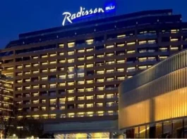 Radisson Hotel Group has reached a significant milestone in Africa, with more than 100 hotels across the continent in operation and under development. Radisson Blu continues to anchor the legacy footprint. At the same time, the Radisson brand is the fastest riser, supported by a strong conversion engine and a concrete pipeline that continues to translate into openings. Building on this momentum, the Group has signed over 15 new hotels and roughly 2,500 rooms in the last 12 months, including new market entries in the Democratic Republic of Congo and Zimbabwe. This week, Radisson Hotel Group is also attending FHS Africa (www.FutureHospitality.com) in Nairobi, reinforcing its commitment to expanding its presence and strengthening strategic partnerships across the continent. Over the past five years, Radisson and Radisson Blu have ranked among the most signed brands in Africa, with one of the highest shares of cumulative openings. The last 12 months set a new benchmark with more than 2,500 rooms signed and multiple market entries. Priority growth markets remain Morocco, South Africa, and Nigeria, where the Group is deepening its presence and widening its brand distribution. Ramsay Rankoussi, Regional Chief Development Officer, Radisson Hotel Group, commented: “We’ve crossed the 100-hotel mark in Africa by staying true to our plan, focusing on where we can lead, moving fast on quality conversions, and partnering with owners who share our ambition. The next phase is about depth in Morocco and Nigeria, a smarter footprint in South Africa, and a stronger resort offering that matches where travelers want to go. Our pipeline is built to open, not just to announce. That is why our conversion share is high, our time to market is short, and our brands are gaining ground in the cities and resort destinations that matter most.” Nigeria shows the model’s resilience. The Group now holds a strong position in the country with 13 hotels in operation and pipeline, while Abuja is carrying a significant active pipeline with three hotels totaling 458 keys. South Africa is being reshaped with priorities in Cape Town, targeted growth in secondary cities such as Durban and Pretoria, and a sharper focus on leisure corridors that include Kruger National Park, Sun City, and the Garden Route. The Group plans to enter Zanzibar and is considering lodge, safari, and affiliation opportunities across Namibia, Botswana, and Zambia to meet the rising demand for nature-led experiences. Conversions remain a core lever for scale and speed. In the last five years, more than 15 hotels, equal to almost 3,000 rooms, joined the portfolio through conversion. This helped the Group lead openings across the continent while keeping brand standards high and owners in mind. Recent signings show the extensiveness of this strategy, with a balanced pipeline of city hotels, resort destinations, and quick-to-market conversions. These signings span the Democratic Republic of Congo, Nigeria, Zimbabwe, and Morocco, including Radisson Blu Kinshasa and three Radisson hotels in Lubumbashi, Radisson Harare, Park Inn Victoria Falls, Radisson Collection Lagos Atlantic, as well as new additions in Casablanca with Radisson Blu Resort & Conference Center Bouskoura, a first Radisson brand hotel in Rabat, and further expansion in Marrakech. Key signings include: Democratic Republic of the Congo Radisson Blu Hotel, Kinshasa Upper-upscale flagship in Gombe Opening late 2026. Set on Boulevard Colonel Tshatshi in the Gombe district, the hotel will offer 110 keys, including suites and a Presidential Suite. Guests can choose from a lobby bar, an all-day dining restaurant, and a pool bar. Wellness includes a gym, massage rooms, and an outdoor pool with a terrace. Meetings and events feature a modern event hall with a pre-function area. The address is well connected, 32 kilometers from N’djili International Airport, 10 kilometers from N’Dolo Airport, and 6 kilometers from Gare Centrale. Radisson Hotel Lubumbashi Panoramic city stay in the DRC’s second city Opening mid-2027. Located on Revolution Road Avenue, the hotel will feature 97 keys, including junior suites and a Presidential Suite. Dining spans a lobby bar, an all-day dining venue, and a rooftop bar and grill with city views. Three flexible meeting rooms and a pre-function area support business and social events. Facilities include a gym and a swimming pool. The location sits near Kipopo Lake, Lubumbashi Golf Club, and La Plage, and is 12 kilometers from Luano International Airport. Radisson Blu Apartments Lubumbashi Upscale apartment living in Lubumbashi’s prestigious Quartier Golf Targeted for 2030. A 160-room property located in Quartier Golf, one of Lubumbashi’s most upscale residential districts, near Kipopo Lake and surrounded by luxury homes and key landmarks including Lubumbashi Golf and La Plage. Planned amenities include a specialty restaurant and bar, a pool bar, and a gym, offering a premium stay experience for extended-stay and leisure travelers. Radisson Airport Hotel Lubumbashi A strategically located airport hotel designed for ease and connectivity Set to open in 2028, this 105-room property will be located just 6 kilometers from Luano International Airport, around a 10-minute drive, making it well positioned for business travelers, transit guests, and airline crews. Planned facilities include a restaurant, lobby bar, pool bar, meeting rooms, and a swimming pool, combining practicality with a welcoming hospitality experience close to the airport. Egypt Radisson Resort Ain Sokhna Groove A large-scale Red Sea resort in one of Egypt’s growing leisure destinations Planned for 2029, Radisson Resort Ain Sokhna Groove will offer 469 rooms, including 50 family rooms, as part of The Groove Ain Sokhna mixed-use development. Located along the Red Sea coast, around 30 kilometers south of Ain Sokhna and approximately 150 kilometers from Cairo, the resort is expected to feature private beach access, a spa, gym and fitness center, several restaurants, plus a ballroom and meeting rooms, catering to both holidaymakers and events demand. Radisson Serviced Apartments COY Sheikh Zayed City Flexible extended-stay accommodation in a fast-growing hub of Greater Cairo Expected to open in 2030, this 120-key serviced apartments property, including six one-bedroom units, will form part of the COY development in Sheikh Zayed City. With a location just 13 kilometers from Sphinx International Airport and 14 kilometers from the Great Pyramids of Giza, the development sits close to major commercial, leisure, education, and healthcare destinations. Planned amenities include a coffee lounge, bar, kiosk, and meeting and event space integrated into the wider co-working environment. Morocco Radisson Blu Hotel & Conference Center, Casablanc a Bouskoura Conference-ready address beside Palm Golf A 119-key hotel with eight suites, a rooftop restaurant, and a dedicated conference center. Event facilities include two boardrooms, while a spa and a large outdoor pool cater to leisure travelers. The hotel is located 20 kilometers from Mohammed V International Airport and next to Palm Golf Palmeraie Country Club. Radisson Hotel & Apartments Rabat Technopolis Dual-component hub in the capital’s innovation park A two-building project in Technopolis, 25 minutes from central Rabat. The hotel will offer 140 rooms, four dining venues, a pool, and a meeting and events space. The adjacent serviced apartment building adds 56 units. Technopolis connects businesses with leading education and research centers, creating a strong base for corporate demand. Radisson Blu Resort Marrakech Ben Akil Low-rise bungalows with views of Atlas Mountains Opening early 2028. A 17-hectare estate featuring 80 bungalow-style accommodations, each with an outdoor terrace. Larger typologies include private pools. The resort sits beside Royal Golf Marrakech and is a 15-minute drive from the city center. Nigeria Radisson Hotel Aba A new internationally branded hospitality destination for Aba Targeted for 2031, Radisson Hotel Aba will introduce 120 rooms, including six junior suites, in a prime riverside location along the Aba River near key transport corridors. The hotel will become the first Radisson-branded property in Aba and the Group’s third branded hotel in Nigeria. Plans for the hotel include a gym, swimming pool, and several meeting rooms, serving both business and local demand. Sam Mbakwe International Airport in Owerri is approximately 56 kilometers away, or a 1 hour and 10 minute drive. Radisson Hotel & Conference Center Yenagoa A conference-focused hotel in the heart of an emerging Nigerian business center Scheduled for 2027, the property will feature 196 rooms, including 16 junior suites, four executive suites, and two Presidential Suites, in Yenagoa, a city that is steadily strengthening its role as an administrative and commercial hub in southern Nigeria. Located near government institutions, business districts, and Bayelsa International Airport, approximately 33 kilometers or 40 minutes away, the hotel is set to benefit from the area’s ongoing infrastructure and hospitality growth while meeting rising demand for accommodation, meetings, and large-scale events. Radisson Collection Hotel, Lagos Atlantic Refined lifestyle luxury on the oceanfront of Lagos’ leading business district Targeted for 2029, Radisson Collection Hotel, Lagos Atlantic will feature 107 rooms, including 16 executive suites and one Presidential Suite, on a prime oceanfront site on Victoria Island. As Lagos’ main financial and commercial district, Victoria Island is home to multinational companies, corporate headquarters, embassies, and strong year-round business activity. Located approximately 33 kilometers from Murtala Muhammed International Airport, around a 45-minute drive, the hotel will mark the second Radisson Collection property in Lagos. South Africa Radisson Serviced Apartments Umhlanga A modern serviced apartment offering in the heart of Umhlanga’s business district Planned for 2029, Radisson Serviced Apartments Umhlanga will introduce 155 rooms in a newly built development within Umhlanga Ridge, one of the area’s most established commercial and lifestyle hubs. The property will be within walking distance of Gateway Theatre of Shopping and close to major office precincts, including Umhlanga Ridge Business Park, La Lucia Office Park, and Glass House Office Park. Comprising studios and apartments, the project is designed to meet growing demand for high-quality extended-stay accommodation in the district. Zimbabwe New market entry Radisson Serviced Apartments, Harare Prime Borrowdale address for extended stays Targeted for end-2028. A 147-key serviced apartments project within a master development near Maxwell Road in Borrowdale. The neighborhood is known for luxury residences, upscale shopping at Sam Levy’s Village, and entertainment at Borrowdale Racecourse. Planned amenities include a café and bar, a gym with sauna, and a pool with a deck. Set to be the only internationally branded hotel apartment offering in the area. Park Inn by Radisson Victoria Falls Resort A resort destination near one of the world’s most iconic natural landmarks Expected to open in 2029, Park Inn by Radisson Victoria Falls Resort will offer 150 rooms, including five suites, in a setting overlooking Zambezi National Park. Located just 5 kilometers from Victoria Falls, around a 10-minute drive, the resort will be ideally positioned near one of the Seven Natural Wonders of the World, a destination that attracts more than 350,000 international visitors each year. With year-round waterfall views, adventure tourism, and access to safari experiences in the surrounding national parks, the property will cater to both leisure travelers and tour groups. Victoria Falls Airport is located approximately 22 kilometers, or a 23-minute drive, away. Leading with the most diverse footprint across the continent, with presence in more than 30 African countries, Radisson Hotel Group blends depth in focus markets with selective entry into new destinations each year.