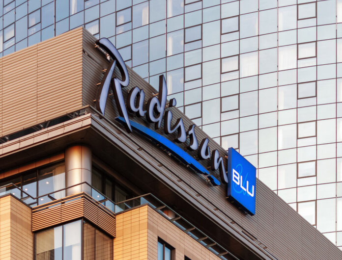 Radisson Hotel Group has reached a significant milestone in Africa, with more than 100 hotels across the continent in operation and under development. Radisson Blu continues to anchor the legacy footprint. At the same time, the Radisson brand is the fastest riser, supported by a strong conversion engine and a concrete pipeline that continues to translate into openings. Building on this momentum, the Group has signed over 15 new hotels and roughly 2,500 rooms in the last 12 months, including new market entries in the Democratic Republic of Congo and Zimbabwe. This week, Radisson Hotel Group is also attending FHS Africa (www.FutureHospitality.com) in Nairobi, reinforcing its commitment to expanding its presence and strengthening strategic partnerships across the continent. Over the past five years, Radisson and Radisson Blu have ranked among the most signed brands in Africa, with one of the highest shares of cumulative openings. The last 12 months set a new benchmark with more than 2,500 rooms signed and multiple market entries. Priority growth markets remain Morocco, South Africa, and Nigeria, where the Group is deepening its presence and widening its brand distribution. Ramsay Rankoussi, Regional Chief Development Officer, Radisson Hotel Group, commented: “We’ve crossed the 100-hotel mark in Africa by staying true to our plan, focusing on where we can lead, moving fast on quality conversions, and partnering with owners who share our ambition. The next phase is about depth in Morocco and Nigeria, a smarter footprint in South Africa, and a stronger resort offering that matches where travelers want to go. Our pipeline is built to open, not just to announce. That is why our conversion share is high, our time to market is short, and our brands are gaining ground in the cities and resort destinations that matter most.” Nigeria shows the model’s resilience. The Group now holds a strong position in the country with 13 hotels in operation and pipeline, while Abuja is carrying a significant active pipeline with three hotels totaling 458 keys. South Africa is being reshaped with priorities in Cape Town, targeted growth in secondary cities such as Durban and Pretoria, and a sharper focus on leisure corridors that include Kruger National Park, Sun City, and the Garden Route. The Group plans to enter Zanzibar and is considering lodge, safari, and affiliation opportunities across Namibia, Botswana, and Zambia to meet the rising demand for nature-led experiences. Conversions remain a core lever for scale and speed. In the last five years, more than 15 hotels, equal to almost 3,000 rooms, joined the portfolio through conversion. This helped the Group lead openings across the continent while keeping brand standards high and owners in mind. Recent signings show the extensiveness of this strategy, with a balanced pipeline of city hotels, resort destinations, and quick-to-market conversions. These signings span the Democratic Republic of Congo, Nigeria, Zimbabwe, and Morocco, including Radisson Blu Kinshasa and three Radisson hotels in Lubumbashi, Radisson Harare, Park Inn Victoria Falls, Radisson Collection Lagos Atlantic, as well as new additions in Casablanca with Radisson Blu Resort & Conference Center Bouskoura, a first Radisson brand hotel in Rabat, and further expansion in Marrakech. Key signings include: Democratic Republic of the Congo Radisson Blu Hotel, Kinshasa Upper-upscale flagship in Gombe Opening late 2026. Set on Boulevard Colonel Tshatshi in the Gombe district, the hotel will offer 110 keys, including suites and a Presidential Suite. Guests can choose from a lobby bar, an all-day dining restaurant, and a pool bar. Wellness includes a gym, massage rooms, and an outdoor pool with a terrace. Meetings and events feature a modern event hall with a pre-function area. The address is well connected, 32 kilometers from N’djili International Airport, 10 kilometers from N’Dolo Airport, and 6 kilometers from Gare Centrale. Radisson Hotel Lubumbashi Panoramic city stay in the DRC’s second city Opening mid-2027. Located on Revolution Road Avenue, the hotel will feature 97 keys, including junior suites and a Presidential Suite. Dining spans a lobby bar, an all-day dining venue, and a rooftop bar and grill with city views. Three flexible meeting rooms and a pre-function area support business and social events. Facilities include a gym and a swimming pool. The location sits near Kipopo Lake, Lubumbashi Golf Club, and La Plage, and is 12 kilometers from Luano International Airport. Radisson Blu Apartments Lubumbashi Upscale apartment living in Lubumbashi’s prestigious Quartier Golf Targeted for 2030. A 160-room property located in Quartier Golf, one of Lubumbashi’s most upscale residential districts, near Kipopo Lake and surrounded by luxury homes and key landmarks including Lubumbashi Golf and La Plage. Planned amenities include a specialty restaurant and bar, a pool bar, and a gym, offering a premium stay experience for extended-stay and leisure travelers. Radisson Airport Hotel Lubumbashi A strategically located airport hotel designed for ease and connectivity Set to open in 2028, this 105-room property will be located just 6 kilometers from Luano International Airport, around a 10-minute drive, making it well positioned for business travelers, transit guests, and airline crews. Planned facilities include a restaurant, lobby bar, pool bar, meeting rooms, and a swimming pool, combining practicality with a welcoming hospitality experience close to the airport. Egypt Radisson Resort Ain Sokhna Groove A large-scale Red Sea resort in one of Egypt’s growing leisure destinations Planned for 2029, Radisson Resort Ain Sokhna Groove will offer 469 rooms, including 50 family rooms, as part of The Groove Ain Sokhna mixed-use development. Located along the Red Sea coast, around 30 kilometers south of Ain Sokhna and approximately 150 kilometers from Cairo, the resort is expected to feature private beach access, a spa, gym and fitness center, several restaurants, plus a ballroom and meeting rooms, catering to both holidaymakers and events demand. Radisson Serviced Apartments COY Sheikh Zayed City Flexible extended-stay accommodation in a fast-growing hub of Greater Cairo Expected to open in 2030, this 120-key serviced apartments property, including six one-bedroom units, will form part of the COY development in Sheikh Zayed City. With a location just 13 kilometers from Sphinx International Airport and 14 kilometers from the Great Pyramids of Giza, the development sits close to major commercial, leisure, education, and healthcare destinations. Planned amenities include a coffee lounge, bar, kiosk, and meeting and event space integrated into the wider co-working environment. Morocco Radisson Blu Hotel & Conference Center, Casablanc a Bouskoura Conference-ready address beside Palm Golf A 119-key hotel with eight suites, a rooftop restaurant, and a dedicated conference center. Event facilities include two boardrooms, while a spa and a large outdoor pool cater to leisure travelers. The hotel is located 20 kilometers from Mohammed V International Airport and next to Palm Golf Palmeraie Country Club. Radisson Hotel & Apartments Rabat Technopolis Dual-component hub in the capital’s innovation park A two-building project in Technopolis, 25 minutes from central Rabat. The hotel will offer 140 rooms, four dining venues, a pool, and a meeting and events space. The adjacent serviced apartment building adds 56 units. Technopolis connects businesses with leading education and research centers, creating a strong base for corporate demand. Radisson Blu Resort Marrakech Ben Akil Low-rise bungalows with views of Atlas Mountains Opening early 2028. A 17-hectare estate featuring 80 bungalow-style accommodations, each with an outdoor terrace. Larger typologies include private pools. The resort sits beside Royal Golf Marrakech and is a 15-minute drive from the city center. Nigeria Radisson Hotel Aba A new internationally branded hospitality destination for Aba Targeted for 2031, Radisson Hotel Aba will introduce 120 rooms, including six junior suites, in a prime riverside location along the Aba River near key transport corridors. The hotel will become the first Radisson-branded property in Aba and the Group’s third branded hotel in Nigeria. Plans for the hotel include a gym, swimming pool, and several meeting rooms, serving both business and local demand. Sam Mbakwe International Airport in Owerri is approximately 56 kilometers away, or a 1 hour and 10 minute drive. Radisson Hotel & Conference Center Yenagoa A conference-focused hotel in the heart of an emerging Nigerian business center Scheduled for 2027, the property will feature 196 rooms, including 16 junior suites, four executive suites, and two Presidential Suites, in Yenagoa, a city that is steadily strengthening its role as an administrative and commercial hub in southern Nigeria. Located near government institutions, business districts, and Bayelsa International Airport, approximately 33 kilometers or 40 minutes away, the hotel is set to benefit from the area’s ongoing infrastructure and hospitality growth while meeting rising demand for accommodation, meetings, and large-scale events. Radisson Collection Hotel, Lagos Atlantic Refined lifestyle luxury on the oceanfront of Lagos’ leading business district Targeted for 2029, Radisson Collection Hotel, Lagos Atlantic will feature 107 rooms, including 16 executive suites and one Presidential Suite, on a prime oceanfront site on Victoria Island. As Lagos’ main financial and commercial district, Victoria Island is home to multinational companies, corporate headquarters, embassies, and strong year-round business activity. Located approximately 33 kilometers from Murtala Muhammed International Airport, around a 45-minute drive, the hotel will mark the second Radisson Collection property in Lagos. South Africa Radisson Serviced Apartments Umhlanga A modern serviced apartment offering in the heart of Umhlanga’s business district Planned for 2029, Radisson Serviced Apartments Umhlanga will introduce 155 rooms in a newly built development within Umhlanga Ridge, one of the area’s most established commercial and lifestyle hubs. The property will be within walking distance of Gateway Theatre of Shopping and close to major office precincts, including Umhlanga Ridge Business Park, La Lucia Office Park, and Glass House Office Park. Comprising studios and apartments, the project is designed to meet growing demand for high-quality extended-stay accommodation in the district. Zimbabwe New market entry Radisson Serviced Apartments, Harare Prime Borrowdale address for extended stays Targeted for end-2028. A 147-key serviced apartments project within a master development near Maxwell Road in Borrowdale. The neighborhood is known for luxury residences, upscale shopping at Sam Levy’s Village, and entertainment at Borrowdale Racecourse. Planned amenities include a café and bar, a gym with sauna, and a pool with a deck. Set to be the only internationally branded hotel apartment offering in the area. Park Inn by Radisson Victoria Falls Resort A resort destination near one of the world’s most iconic natural landmarks Expected to open in 2029, Park Inn by Radisson Victoria Falls Resort will offer 150 rooms, including five suites, in a setting overlooking Zambezi National Park. Located just 5 kilometers from Victoria Falls, around a 10-minute drive, the resort will be ideally positioned near one of the Seven Natural Wonders of the World, a destination that attracts more than 350,000 international visitors each year. With year-round waterfall views, adventure tourism, and access to safari experiences in the surrounding national parks, the property will cater to both leisure travelers and tour groups. Victoria Falls Airport is located approximately 22 kilometers, or a 23-minute drive, away. Leading with the most diverse footprint across the continent, with presence in more than 30 African countries, Radisson Hotel Group blends depth in focus markets with selective entry into new destinations each year.